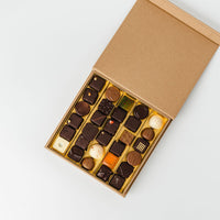 Coffret kraft élégant - disponible en format de 9, 20 ou 30 pralines.
